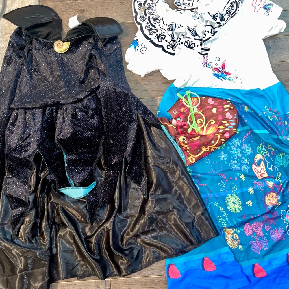 Disney Halloween costumes. Ursula and Mirabel. Girls size XL ( 10-12)